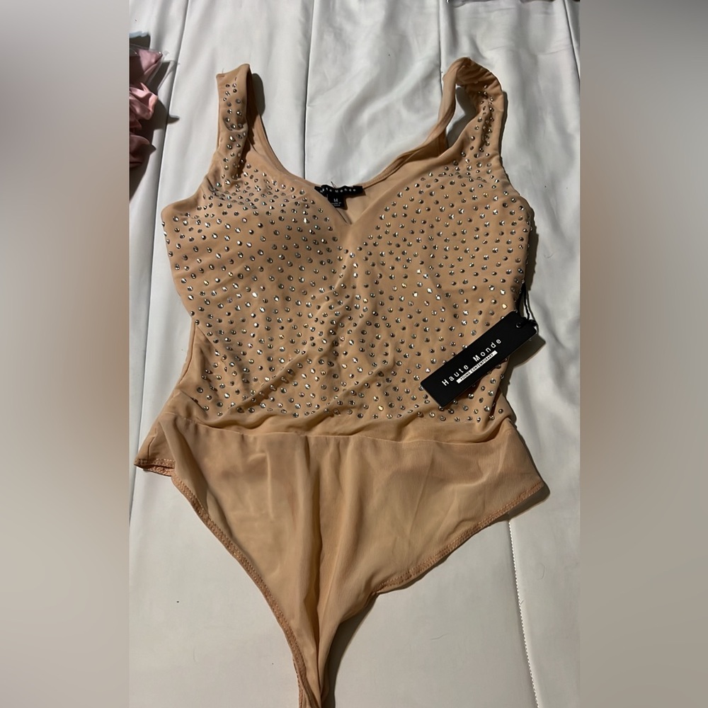 New with rage nude body suit